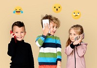 Children with emoticons talking on mobile phones