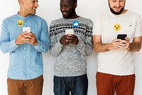 Happy diverse men using mobile phones