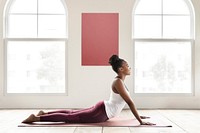 Woman doing yoga in cobra pose