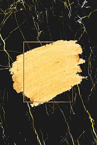 Gold paint with a golden rectangle frame on a black marble background