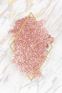 Pink gold glitter with a brownish red rhombus frame on a white marble background