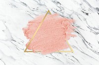 Pastel pink paint with a gold triangle frame on a white marble background