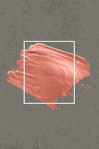 Metallic orange paint with a white frame on a gray background