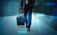 Businessman walking with his luggage