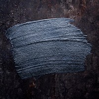 Metallic blue oil paint brush stroke texture on a black background