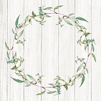 Botanical green wreath on a wooden background