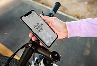 Cyclist using a mobile phone mockup