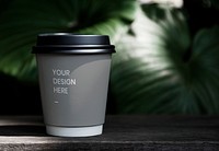 Coffee cup mockup on a table