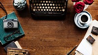 Retro typewriter on a wooden table website banner template