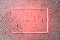 Neon red frame on a brick wall