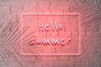 Neon red hello summer sign on a wall