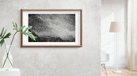 Wooden frame mockup on a gray wall