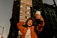 Black female blogger recording her lives in downtown