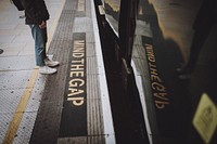 Man waiting for train on platform