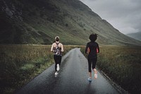 Friends jogging in the Scottish Highlands