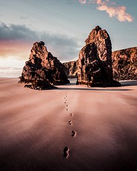 Footsteps on the sand passing through the outer Hebrides island, Scotland