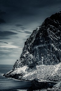 Snowy island in the winter by the ocean