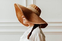 Woman in a vintage wide brim summer hat