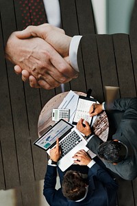 Professional corporate businessmen shaking hands