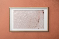 Wooden picture frame hanging on an orane wall illustration