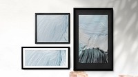 Picture frames hanging on a white wall illustration