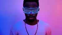 Black man wearing neon glasses