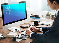 Businessman using a  computer mockup