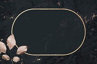 Oval gold frame with foliage pattern on a black marble background