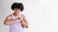 Black young woman using a smartwatch mockup