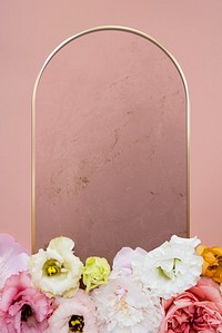 Golden oval floral frame on a pink background
