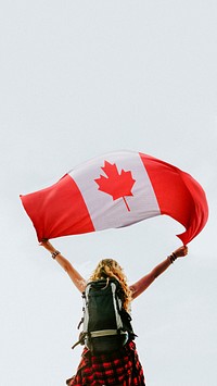 Woman holding the Canadian flag mobile wallpaper