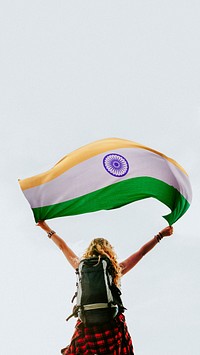 Woman holding the Indian flag mobile wallpaper