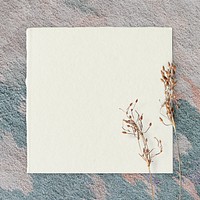 Dried flower decorated ripped paper mockup design