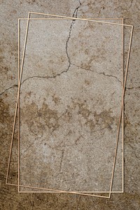 Gold frame on an aged brown concrete wall mockup design