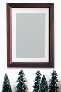 Wooden frame mockup with Christmas tree decorations