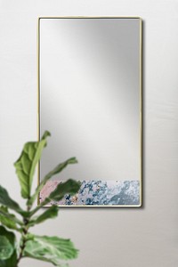 Gold framed mirror on the wall mockup