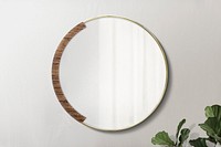 Circular mirror with a wooden backdrop with fiddle-leaf fig mockup
