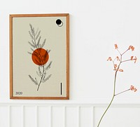 Wooden picture frame hanging on a white wall mockup