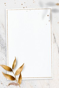 Golden olive leaves with rectangle frame on marble textured background