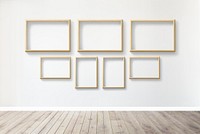 Modern frame mockups on a white wall