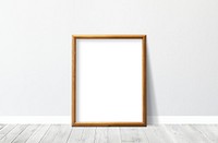 Wooden frame against a gray wall