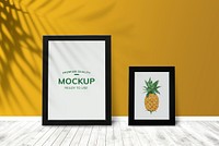 Pineapple in a frame mockup against a yellow wall