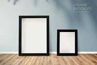 Black frame mockup on a gray wall