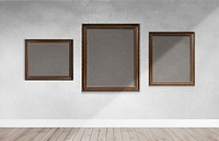 Modern frame mockups on a gray wall