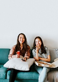 Sisters eating pizza together during coronavirus quarantine