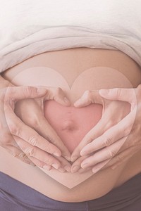 Pregnant woman on a beige background