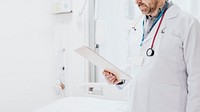 Doctor reading a coronavirus patient medical chart