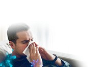 Man sneezing and showing coronavirus symptoms