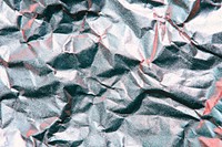 Silver scrunched paper textured background
