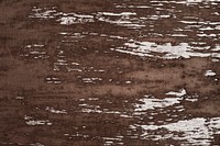 Scratched brown wooden textured flooring background